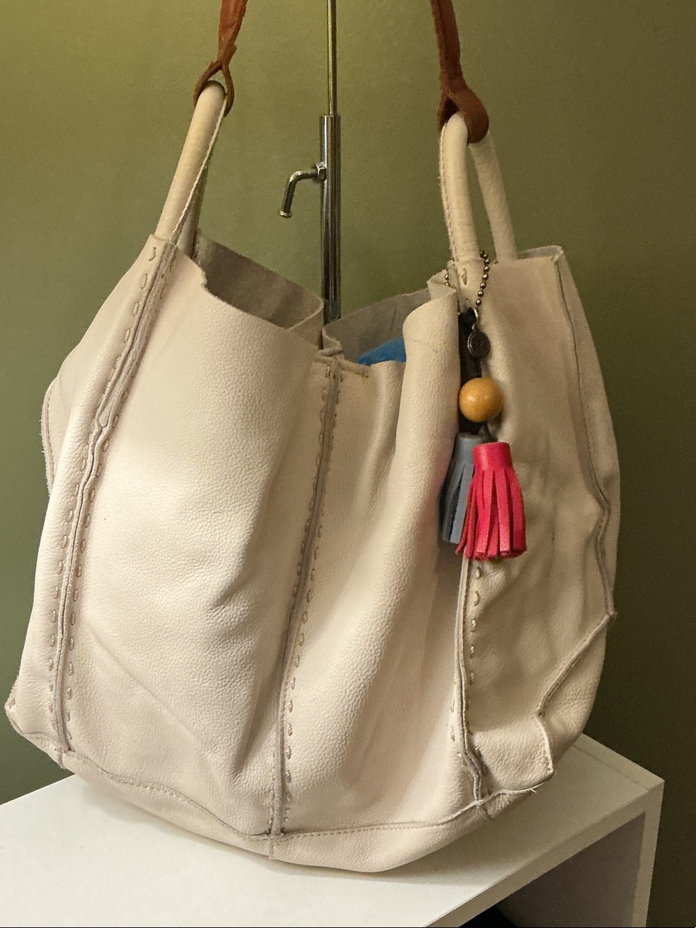 The Sak Cream Leather Hobo Bag Tote with Colorful Tassel Charm Brown Handle